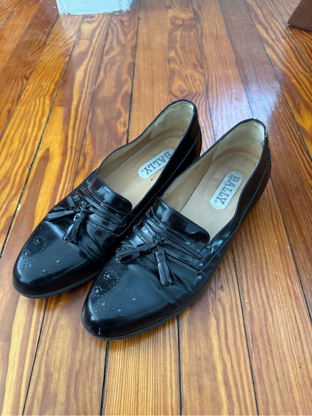 Bally Black Leather Tassel Slip-On Loafers